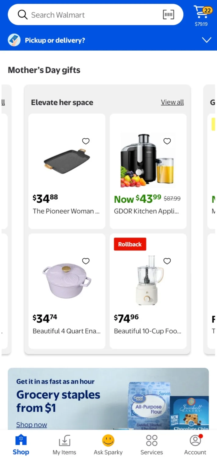 A Mother's Day gifts carousel labeled 'Elevate her space' filled almost entirely with kitchen items: a griddle, a juicer, a Dutch oven, and a food processor